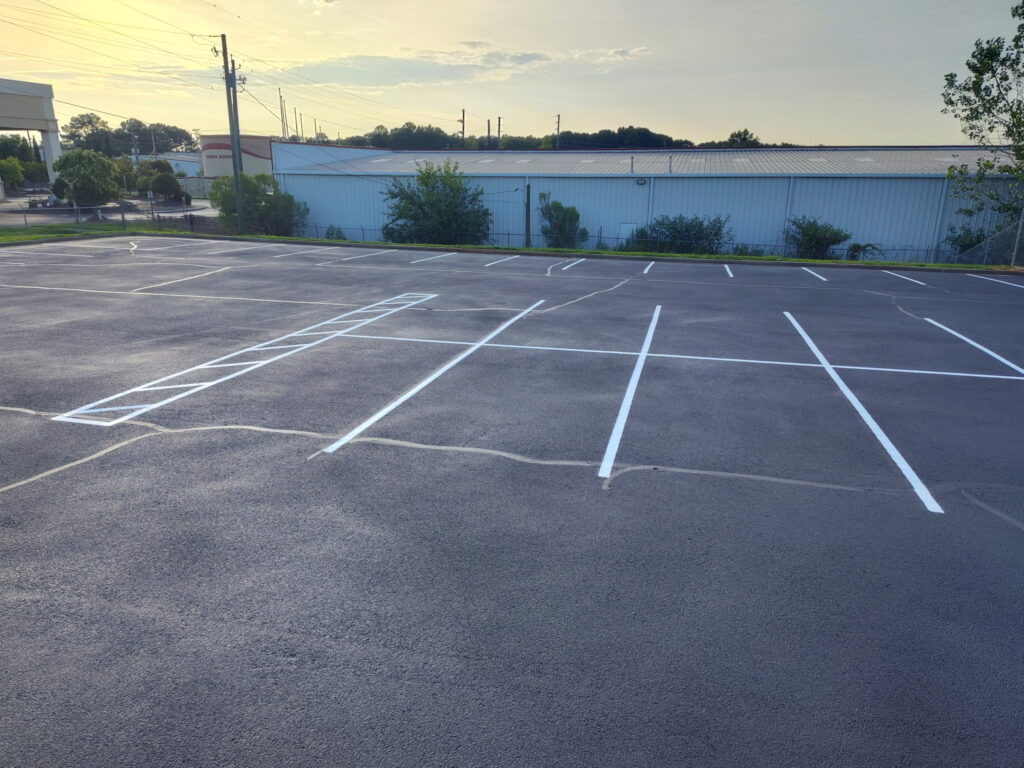 Crackfill, sealcoat, striping, at Hosea.